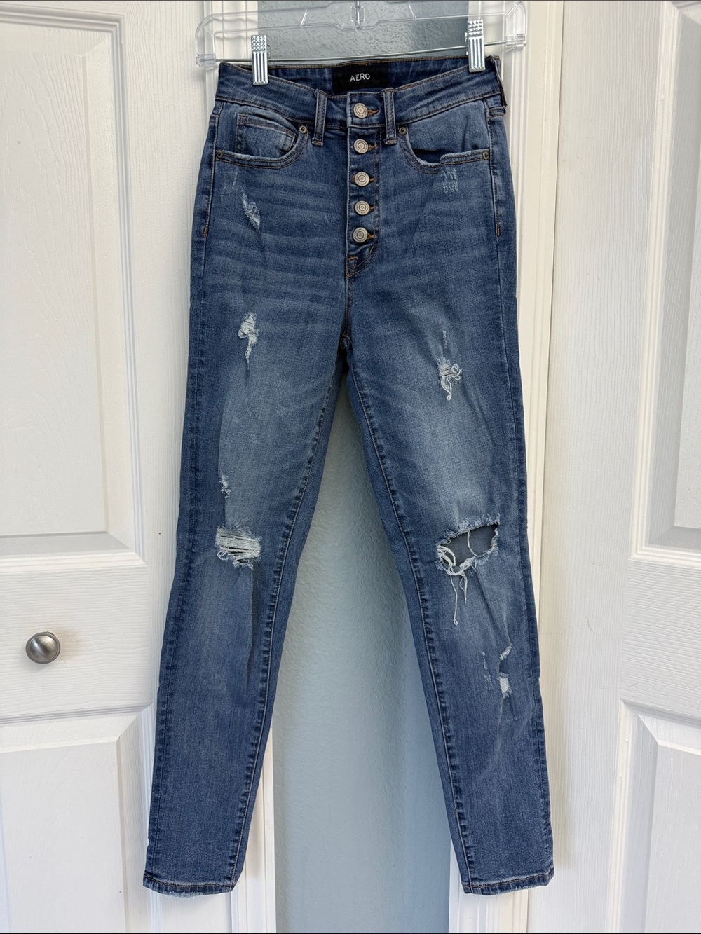 Aero Super High-Rise Distressed Skinny Jeans - size 0